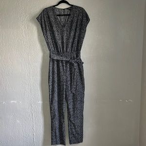 Express Jumpsuit Size Small Stretchy band in middle section and removable belt.